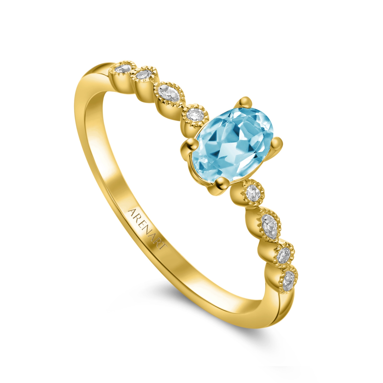 Złoty pierścionek z niebieskim topazem i diamentami, żółte złoto